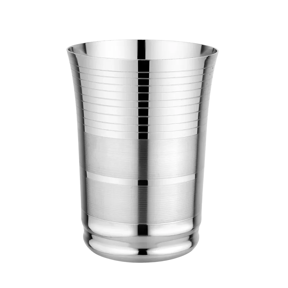 Stainless steel tumbler kitchen utensil with ribbed design on a white background
