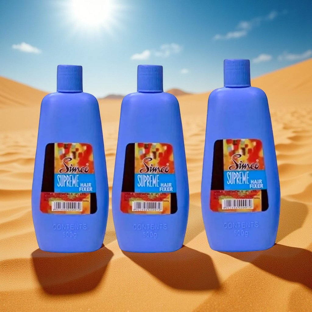 Three blue bottles of Supreme Hair Fixer on sand under bright sunlight, not kitchen utensils.